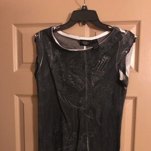 Sheer sleeveless HD top.  Rhinestone accented.